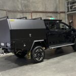 Sleek black aluminium canopy with clean, flat sides