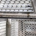 Interior view of the dog box section showing ventilation panels, gas struts, and reinforced aluminium framing