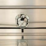 Whale tail three-point lock for UTE canopy