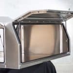 Durable UTE canopy with gas-assisted doors open, displaying the interior layout and build quality