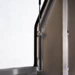 Close-up of a gas strut hinge on a UTE canopy