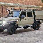 The X3 LC79 Combo Full Selections from Oz Chivalry delivers a complete tray and canopy package with roof racks, LED lighting, and rear dual spare mounts