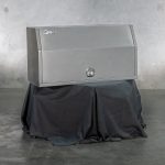 Closed aluminium UTE canopy displayed on stand with black cover