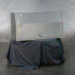 Heavy-duty alloy toolbox featuring adjustable shelf and drawers