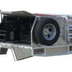 Heavy-duty UTE canopy featuring spare wheel holder and fold-down ladder rack