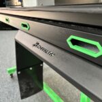 Close-up of a Chivalry UTE canopy frame featuring green side rope covers for protection and visual contrast